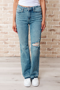 Isla Judy Blue Mid Rise Distressed Released Hem Bootcut Jeans