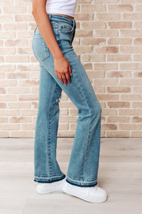 Isla Judy Blue Mid Rise Distressed Released Hem Bootcut Jeans