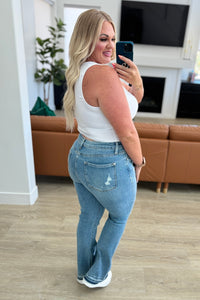 Isla Judy Blue Mid Rise Distressed Released Hem Bootcut Jeans
